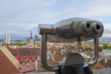 Tallinn Estonia May 21, 2021 telescope for observation decks and cityscape on the old and modern...