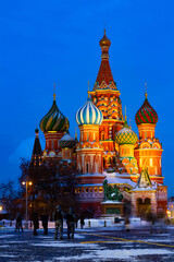 Fototapeta na wymiar Colorful Cathedral of Intercession of Most Holy Theotokos on Moat or Saint Basils Cathedral on Red Square of Moscow on winter evening, Russia