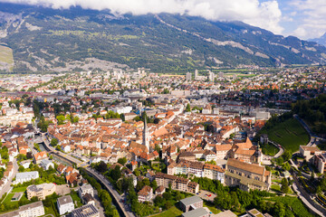 Fototapeta na wymiar Scenic aerial view of alpine town of Chur on Plessur river in summer, canton of Grisons, Switzerland