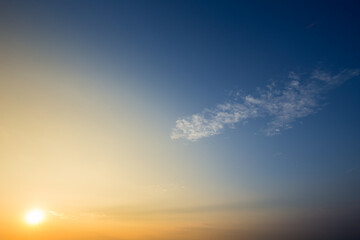Naklejka na ściany i meble Colorful dramatic sky with cloud at Sunrise.Sky with sun background