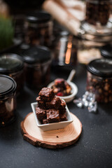 Homemade Brownies served on black table at cafe​