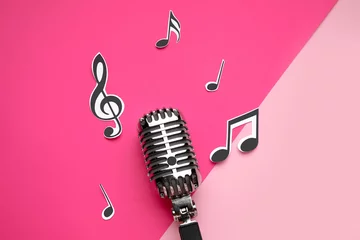 Zelfklevend Fotobehang Retro microphone with music notes on color background © Pixel-Shot