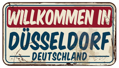 Welcome To Dusseldorf in German. Vector Damaged Signboard.