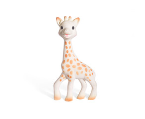 baby Giraffe doll isolated on white background with shadow reflection