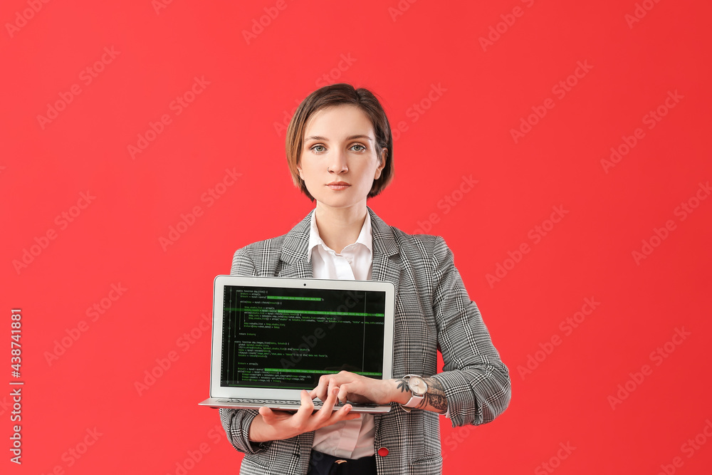 Aufkleber female programmer with laptop on color background