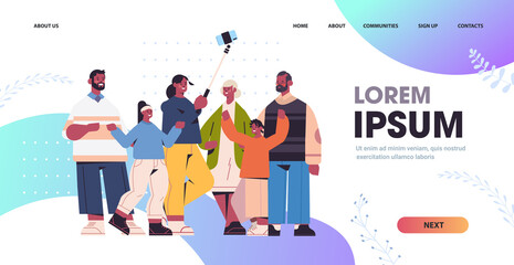 multigenerational african american family using selfie stick taking photo on smartphone camera