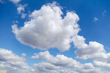 Obraz na płótnie Canvas White clouds against blue sky