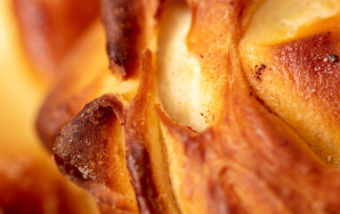 Ruddy crust on a sweet bun as a background.