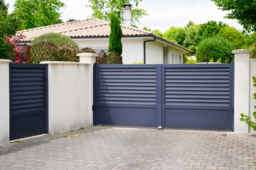 modern wicket and grey gate of home aluminum portal suburb door in house - obrazy, fototapety, plakaty