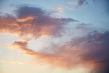 Naklejka na ściany i meble Blue hour - gorgeous sunset sky with pink twinkle clouds. Natural background. High quality photo
