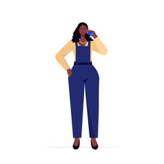 businesswoman leader in formal wear talking phone african american business woman standing pose leadership
