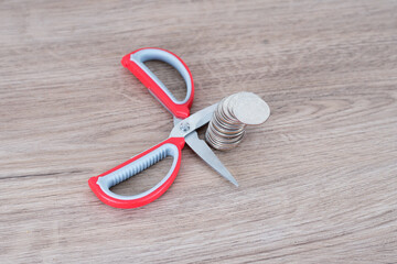 Scissors and cut Yen banknotes
