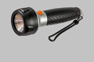 Flashlight on a gray background