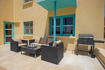 Terrace patio with chairs in tropical luxury holiday villa