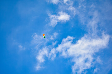 Indian Tricolor shaped balloons flying in the sky