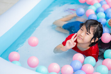 kid swimming at the pool, happy time