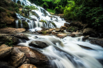 Beautiful waterfall in green forest in jungle at Ching Mai  Thailand
