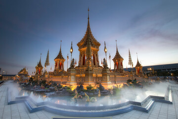 Obraz premium Royal crematorium. The royal pyre for royal funeral of H.M. King Bhumibol Adulyadej at Sanamlaung, Bangkok, Thailand. Long exposure, Moving crowd.