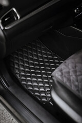 leather floor mat with diamond shape texture. eco leather luxury floor mat on the front row car...
