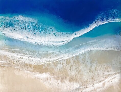 Top view on sea wave with white foam and light beige sand. drawing with epoxy resin. Close-up of deep rich blue, azure, turquoise color of water, shore. Trendy painting. Contemporary art