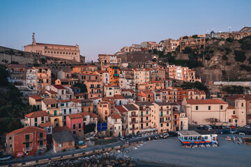 Aerial view colorful houses by the sea. Calabria, Scilla. - obrazy, fototapety, plakaty