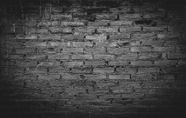 Black brick wall with shadow texture can be use as background 