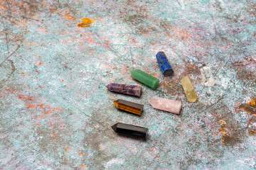 Healing chakra crystals on marble background