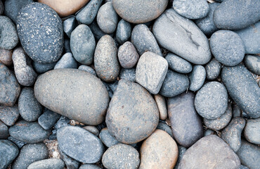 Pebbles stone or river stone  background with vintage filter 