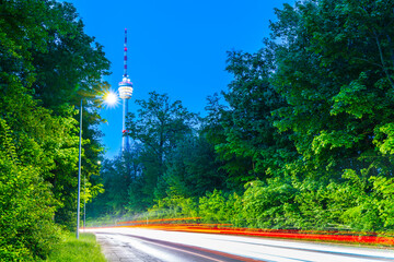 Germany, Stuttgart city skyline of tv tower building and street lights night atmosphere of...