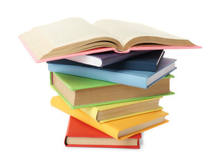 Many colorful hardcover books on white background