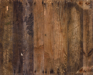 Wood background from old planks. Wooden texture of vintage weathered reclaimed barn wood, with rusty nails cracks and stains, sharp and detailed.