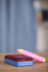 Blackboard eraser and chalk