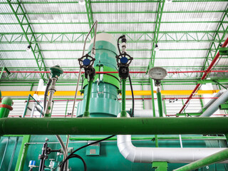 Temperature gauge for measuring instrument close up in industry zone at power plant.
