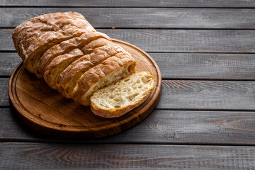 Close up of whole grain bread on cuttin board