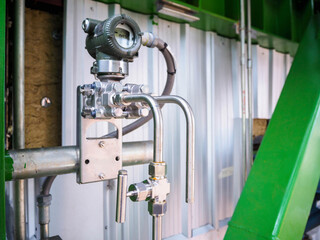 Pressure gauge of measuring instrument close up in industry zone at power plant with closed up