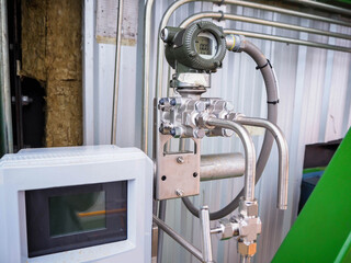 Pressure gauge of measuring instrument close up in industry zone at power plant with closed up