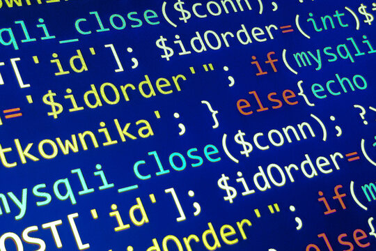 Software development pattern. Programmer monitor with php language code. Closeup tablet screen technology background