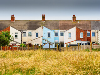 Fototapeta na wymiar A row of houses with colorful facades in Withernsea