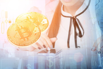bitcoin payment, digital virtual currency concept,girl pays with cryptocurrency via a mobile phone