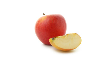 Ripe apple and slice isolated on white background