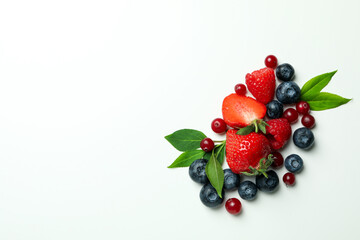 Delicious fresh berry mix on white background