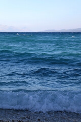 Waves on a beach in Croatia. Selective focus.