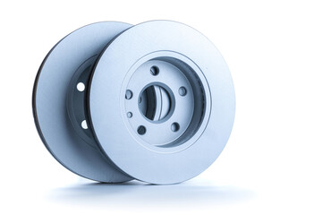 Sapre parts. Auto motor mechanic spare or automotive piece on white background. New metal car part. Repair and vehicle service with space for text.