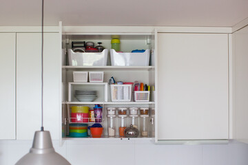 Storage in the kitchen. Home organization idea.  - obrazy, fototapety, plakaty