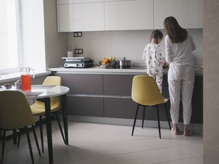 family photo session, mom dad and children, liveliness, play, prepare food, emotions and love