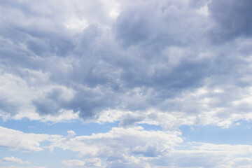 clouds float across the sky