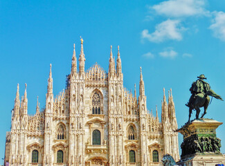 Fototapeta premium Duomo, Milan Cathedral with equestrian statue in the foreground, Italy