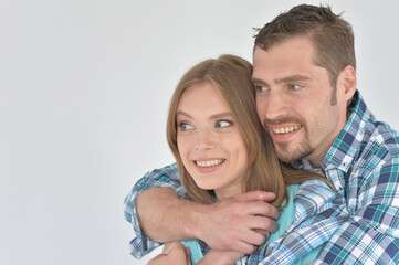 Fototapeta premium Portrait of happy young couple posing at home