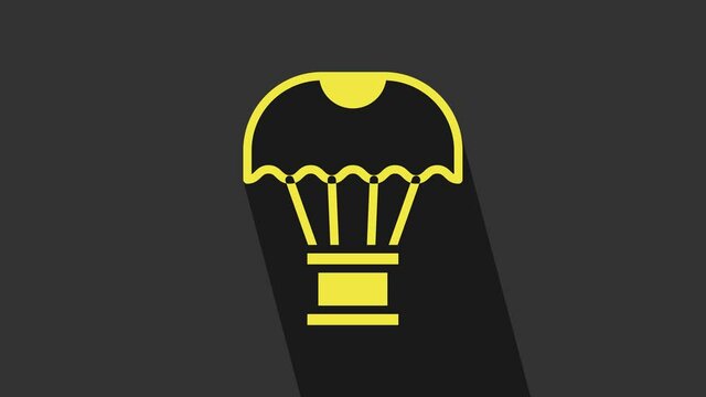 Yellow Box flying on parachute icon isolated on grey background. Parcel with parachute for shipping. Delivery service, air shipping. 4K Video motion graphic animation