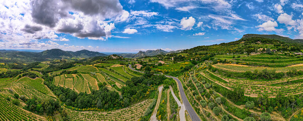 Aerial panoramic view of the vineyard in the Côtes du Rhône at the base of the Mont Ventoux beside les Dentelles de Montmirail - obrazy, fototapety, plakaty